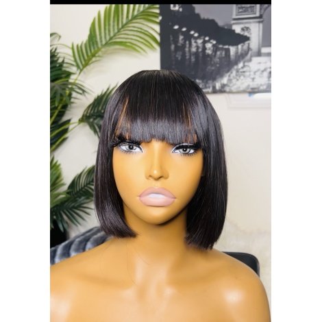 EDNA UNIT.                                      Closed fringe 8” bob.                                 Vietnamese SDD
